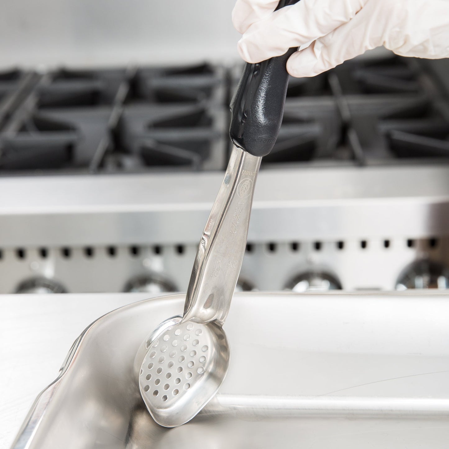 Vollrath Heavy-Duty Color Coded Oval Perforated Spoodle, 1 oz, Black - 6422120